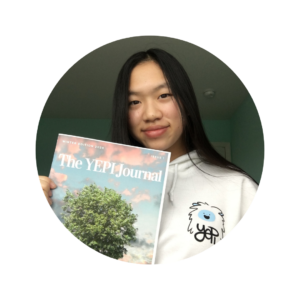 Youth Environmental Power Initiative participant holding the YEPI Journal